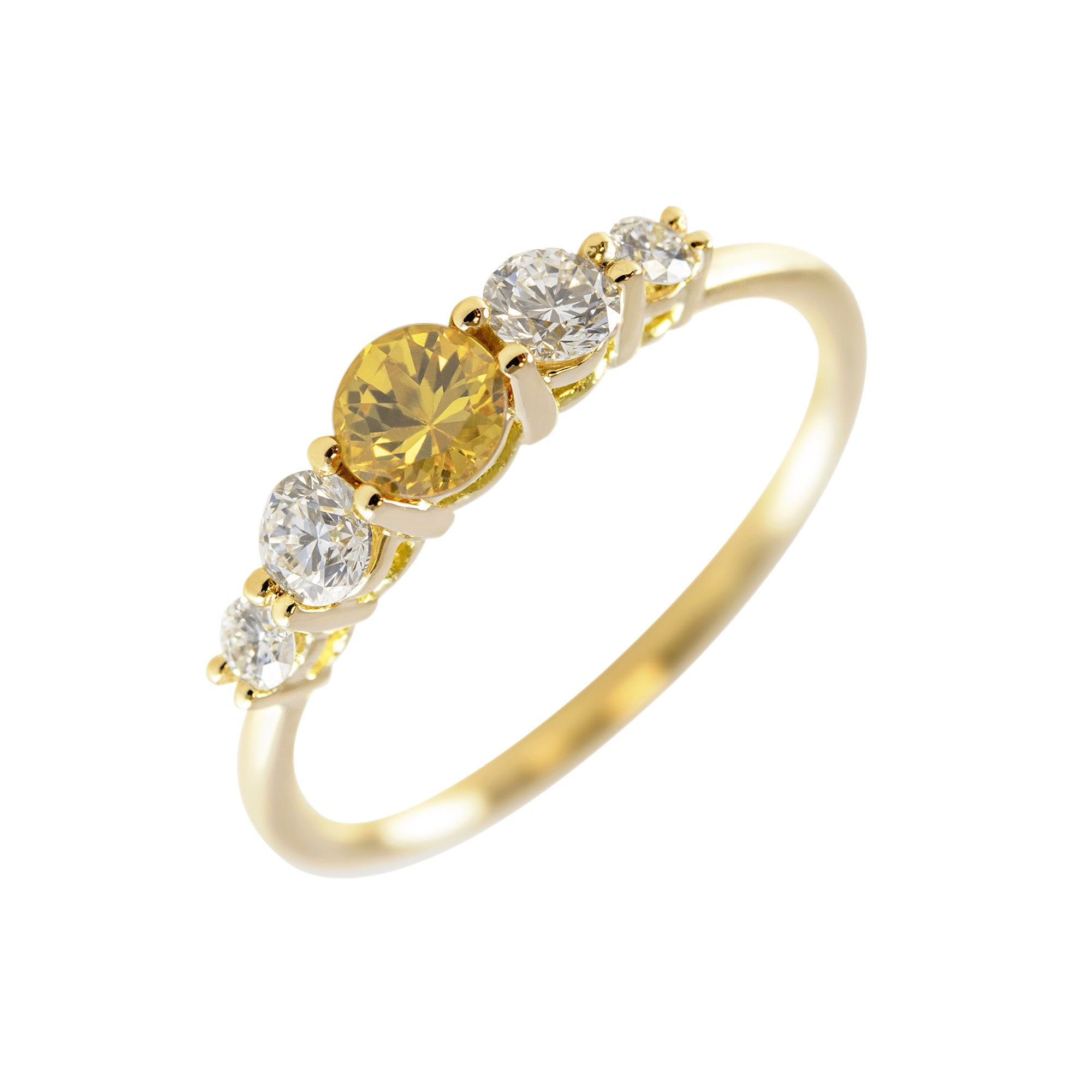 Anillo de Oro 18K con zafiro amarillo y diamantes en fondo blanco